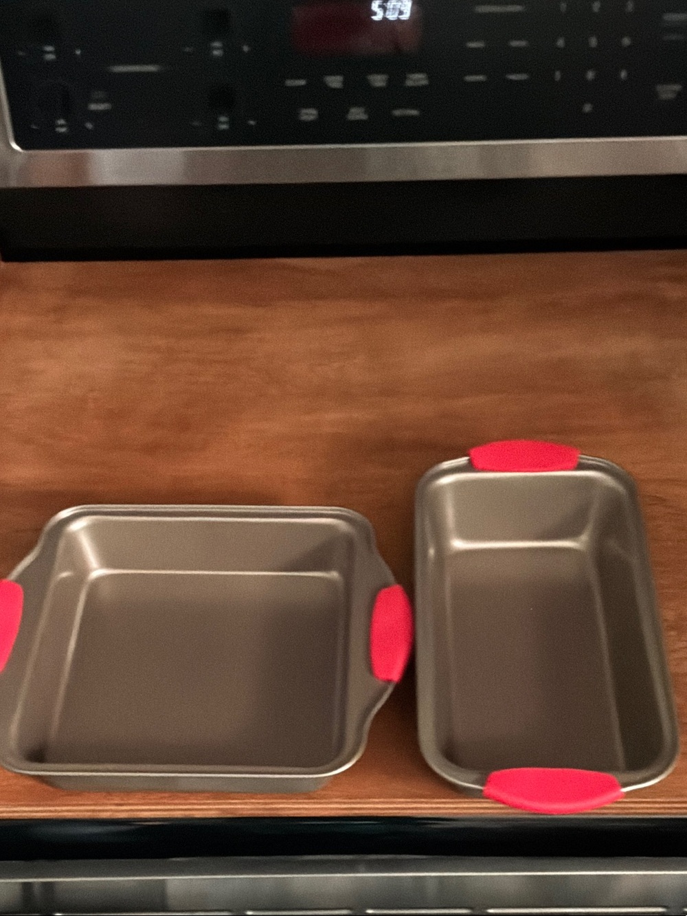 Gray Nonstick Baking Pan Set with Red Silicone Handles